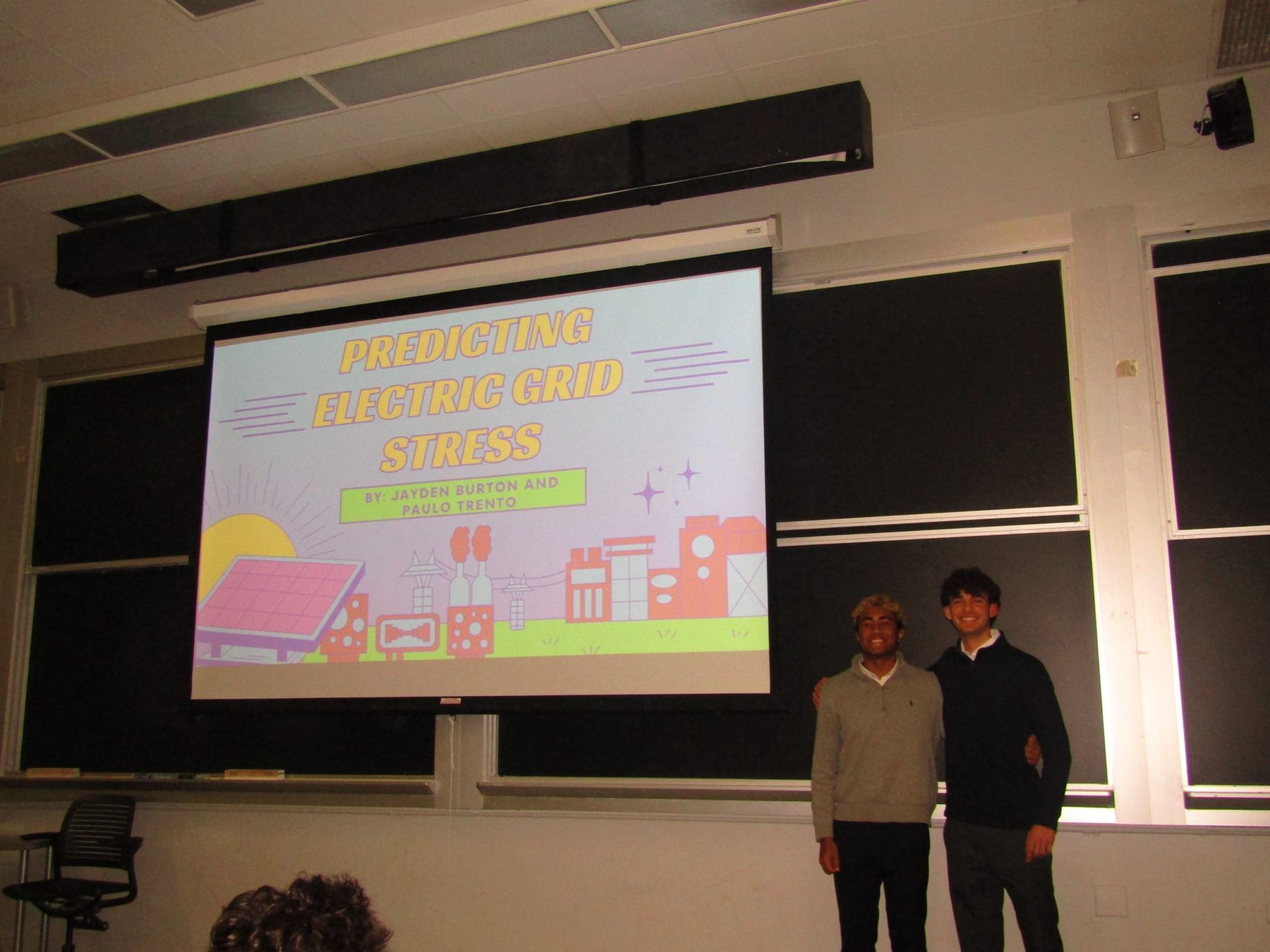 Jayden and Paulo presenting their Fall 2025 Junior Consultant Program final project